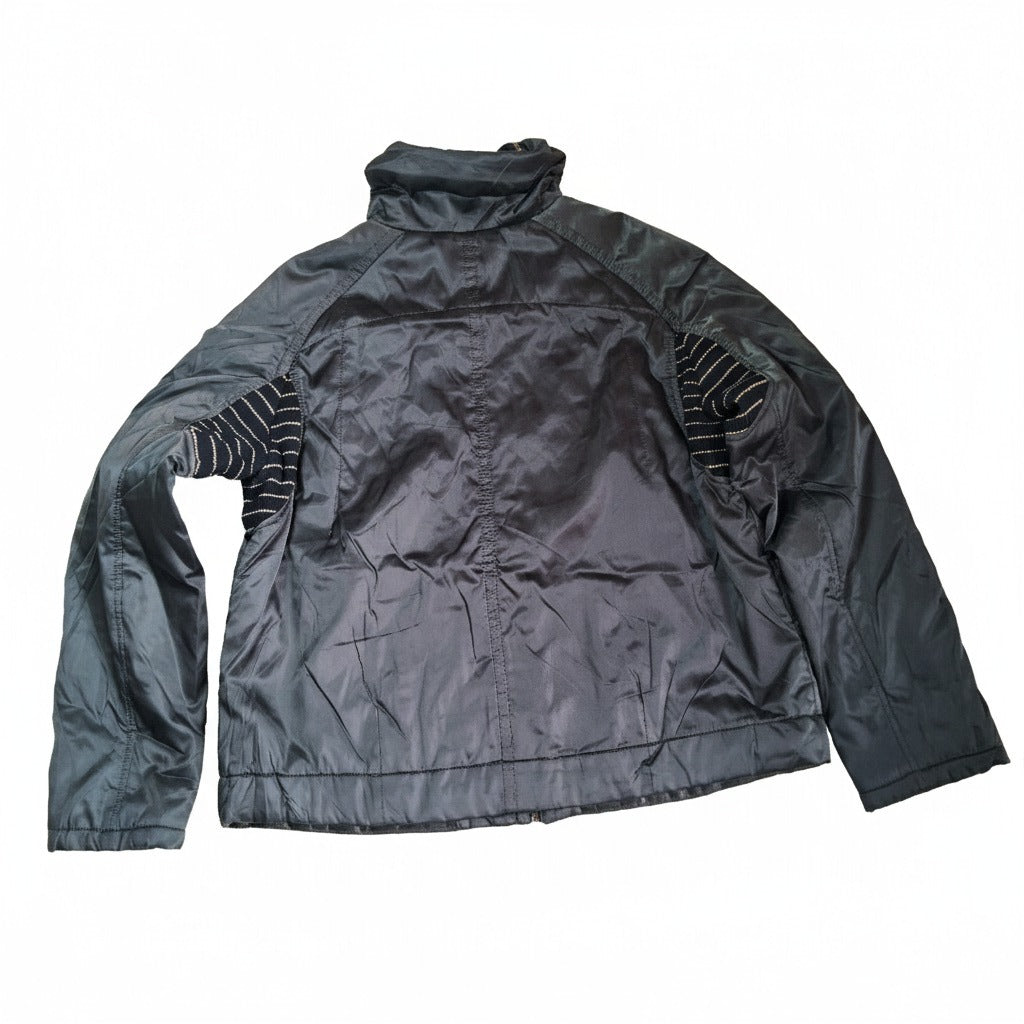 Women The "Lumière Ruffle" Statement Quilted Jacket
